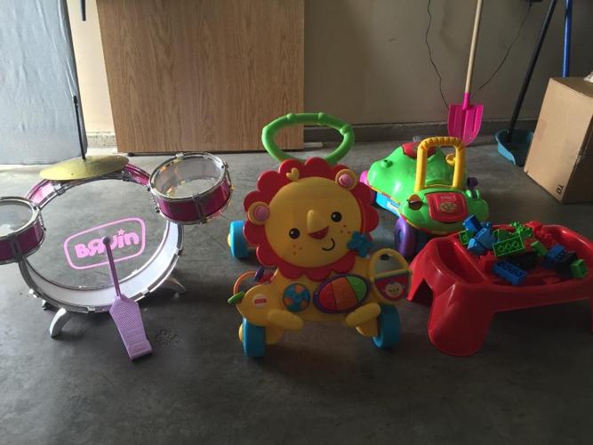 assorted toys and baby's tub