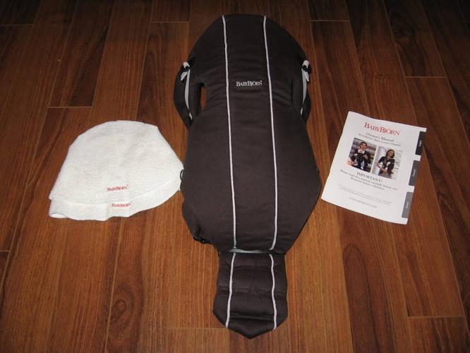 Baby Bjorn Carrier with 2 Bjorn 'drool cloths'.