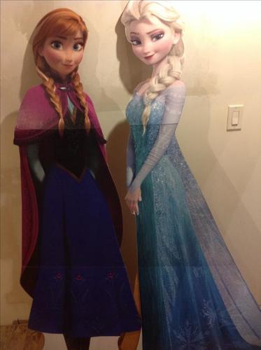 Frozen Anna and Elsa stand