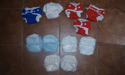 11 Newborn cloth diapers
 
2 different brands, 6 Ecobums and 5 rumpsters.
 
-Good Condition, both are "all in one".
 
-Ecobums are fleece inside: wicks away moisture, very absorbant, and very soft. Velcro closure.
 
-Rumpster are organic cotton and hemp,
