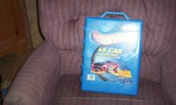 good condition.  I also have a blue Hot Wheels 48 car carrier case.... $10. each...see my other items and garage sale ad.
