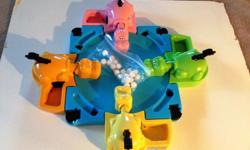 2005 Hungry Hungry Hippos blue game board with 4 Hippos and 20 white marbles that came with the game
Frantic colorful game to play that appeals to kids
It is like-new and barely used Very clean Works Perfect! Excellent condition from a smoke and pet free