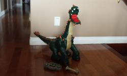 3 feet dinosaur robot in excellent condition. Walks, roars, lights up and moves its head. Asking $20