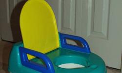 Safety 1st potty that converts to a toilett seat and a step stool when they're ready.