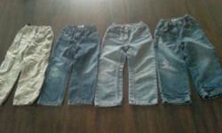 I have four pair of 4T jeans. 2 Pair of levis (one light one dark) one pair of medium color from children's place and one khaki pants. All are in excellent condition. Light pair of levi's have a tiny grass spot but not hardly noticeable at all (see second