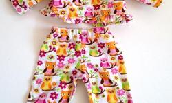 Handmade flannel owl pyjama set fits 18" dolls. Excellent condition. Non smoking home.