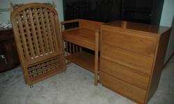 Medium Brown Solie Oak
1 Crib - no mattress
1 Dresser - 4 drawers
1 Change Table
Just like new