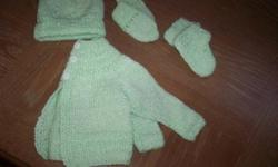 This set is hand knit, cardigan has white anchor buttons, booties and mittens need ribbon inserted yet, never been used....also have a light blue set with leggings, cardigan, bonnet and mitts...$10 each set.....also have 2 baby boys cardigans, just $5