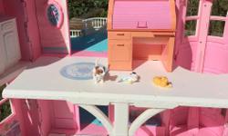 All the items are in played with condition. But still in good condition. Here is a list of what is included
- Barbie fold and fun doll house with original bathtub, bed, kitchen and sofa.
- juice bar with milkshake machine
- roll top desk
- Barbie red