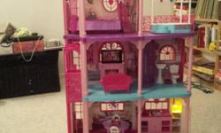 Barbie house with furniture and supplies. In excellent condition. Comes from a smoke free home.