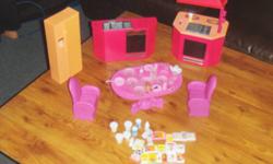 BARBIE KITCHEN SET INCLUDES FRIDGE STOVE, ISLAND WITH A SINK, FOOD DINNING ROOM TABLE  DINNERWARE & TWO CHAIRS
PLEASE CALL AMBER 952-3162
SEE ALL MY OTHER AD'S.
 SOMETHING FOR EVERYBODY