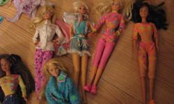 Great for Christmas ! 
 
barbie dolls, ken dolls, kelly and a little boy (can't remember the name), horses, jeep and horse trailer,  clothes,  all kinds of accessories, bedroom set.
 
additional pieces but I had no room left to load them....
please