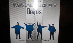 --Beatles Trivia Pursuit game. Brand new. Never been opened.