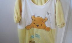 Brand new, never worn Disney "Winnie the Pooh" winter sleeper/bunting bag size 12mth, yellow, very soft and comfortable, sleeper is not attached to bunting bag so it can be used seperatly, bunting bag has hole for car seat buckle, sleeper has attached