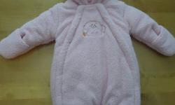 Tags cut, never been worn, pink snowsuit.  Two convenient front zippers to place baby in easily.  Adorable