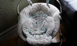Very clean Bright Starts Comfort and Harmony Cradling Bouncer.&nbsp;
Discription: Comfortable, cradling seat with soft, plush fabrics&nbsp;
Soothing vibration & melodies, volume control and auto shut off&nbsp;
Seat features cushioned foot pillow and side