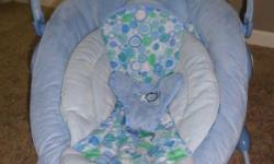 Bright Starts Bouncy Chair plays music and vibrates. Excellent used condition from a pet/smoke free home.