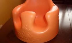 Orange Bumbo chair for sale.  Comes with removable plastic tray.  Perfect condition.  Retail price ~ $65.  Asking $40.  Call or e-mail if interested.