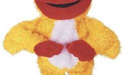 ELMO LOVES TO SHOW OFF AND CHILDREN LOVE HIM! The fuzzy red Muppet is dressed up in a chicken suit, with only his red face and hands showing. The fuzzy suit is bright yellow with a white chest, orange feet, and a red comb on the hood. Press the button on