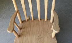 Rocking chairs are made entirely
 of solid oak.Have one of each in stock.