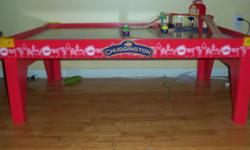 This Chuggington Train Table is literally only days old. We bought it for our son for Christmas and ended up winning the exact same one two days after Christmas!! go figure...So this is a BRAND NEW, solid wood and fully assembled table. It's pretty big