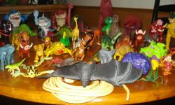 Dinosaurs, Lion King and other figures. Well over 30. All in good condition and clean.