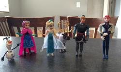 Frozen figurines. Excellent condition, from a smoke and pet free house. Stand 2 inches tall.