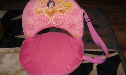 Pink Disney Princess folding chair.  Cinderella, Snow White, and Sleeping Beauty are pictured on the front.  Sits flat, folds up and has a carrying strap.  Cover can be unzipped and removed for easy washing.  Clean with no rips and from smoke-free home.