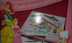 This light up tracing desk includes:
---a light up tracing desk
---various princess pictures to trace
---paper
---package of 12 mini pencil crayons
---batteries