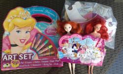 All about Princesses.
-Cinderella Art kit
-Beauty and the Beast jumbo puzzle
-Ariel and Brave dolls (no clothes)