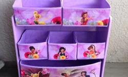 Great little storage unit for kids toys, stuffies, or clothes. Features the princesses of Disney.