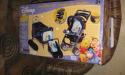 Winnie the Pooh Doll Travel System
Item includes stroller, car seat, playpen, mobile and more!
Recommended Age: 2 years and up
Very Lovely Gift For Kids
Includes instructions in original Box
Very clean Excellent condition from a smoke and pet free home