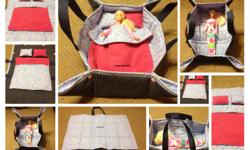 Here is a pretty little Barbie Doll size fabric/cloth bed/basket carrier. It is made of recycled denim and cotton fabric. Has quilt batting in the middle. Handles are nylon webbing. Reversible Comforter and 2 Reversible Pillows included.
This would be