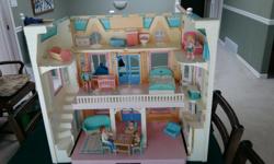 Doll house that folds up, includes everything in the pictures.