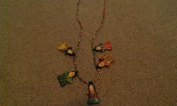Very unique doll necklace. Very colorful and fun for your little girl. Asking $5.00
Also have a colorful fish broach. Very unique piece. You won't find either of these items in your local department store. Asking $5.00 or make an offer on both pieces.