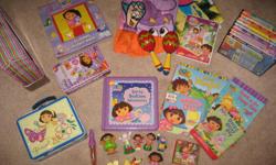 Selling a huge lot of Dora items in perfect used condition.
- dora lunch box
- 8 figurines
- light up pen
- puzzle
- dance-along musical adventure dvd with play clothes, maracas and mat.
- 9 dvd's
- dominoes
- 2 board books
- 2 paper back books
- Dora's
