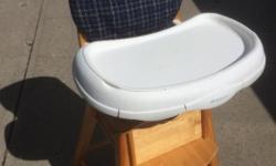 Good shape. Cloth backing. Seatbelt works. Plastic tray chair is wood. $50 OBO