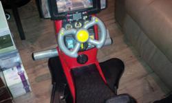 Electronic ride on racing toy. Full functional, battery operated. phone linda at 306-757-2474