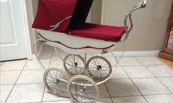 Beautiful English doll pram . Silver Cross style. Burgundy and white in good condition. Floor to handle 34" high. Length 31"
A wonderful gift for a little girl.