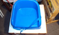 Booster seat that straps to kitchen chair for feeding. For older toddlers that don't need straped in but are not quite able to reach the table.Bottom comes apart and can be used as a stepping stool.