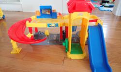 Great Fisher Price toy car garage!
Car garage has a car lift, car wash, 2 slides, fix-up station, gas pump. Comes with 2 Little People mechanics, a tow truck and a car. My little boy loved this from age 2 - 5 years. Will also throw in a truck with a