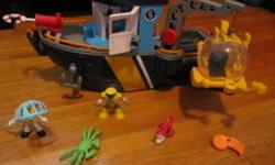 Fisher Price Imaginext Ocean Boat 
 
Imagine...you've set sail on the high seas looking for adventure, and you've found it! While loading the cargo in the hot sun you see a giant splash out in the distance. What could it be? You run to the submarine to