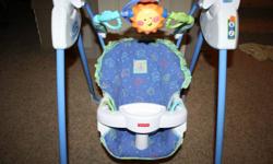 Fisher Price Linkadoos Infant Swing. Excellent Condition. This swing is battery operated. It has 6 different speeds and plays 10 different songs and a toy bar over top. It has two different reclining settings and includes 2 linkadoos toys and washable