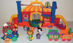 Fisher Price Little People Circus, plays circus music, batteries included, comes with zoo keeper plus 6 animals shown, clean excellent smoke free condition, plus 3 circus vehicles from another set with 3 children riding the Merry Go Round, asking $ 20 for