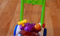 Push and pop mower toy