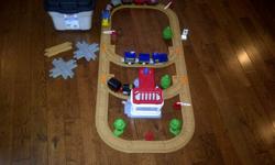 Geo Tracks set with gas station, track, 3 trains, 9 extra cars, trees and signs. My boys have loved this set but have outgrown it.