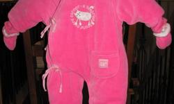 Never worn, 3-6 month girls 1-piece pink snow suit. Has hood and detachable mittens and booties.