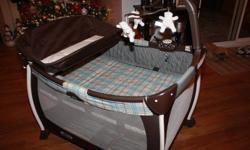 Graco Pack n play playpen, Excellent condition.
Features:
Bassinet up to 15 lbs.; change table up to 25 lbs.; playard up to 30 lbs. and 35" tall
5 classical songs, 5 soothing nature sounds; checklight; timer
Removable full-size bassinet with quilted