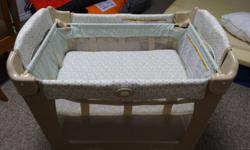 It features a 2-level bassinet that adjusts as your baby grows. It is 20% smaller than traditional playards and folding is made a cinch with the push-button, making it perfect for compact travel and in-home use. Comes with 1 1/2 inch foam mattress from