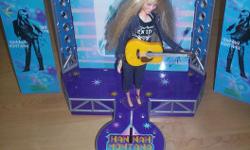 In excellent working condition. Plays music from Hannah Montana songs and stage lights work also. Comes with doll.